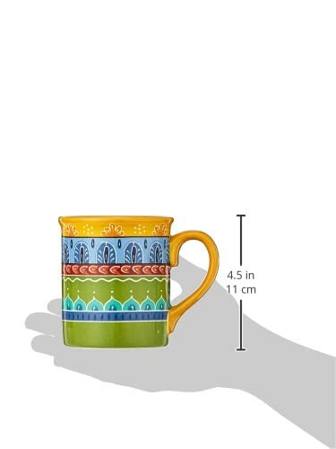 Colorful ceramic mug with measurement in hand.