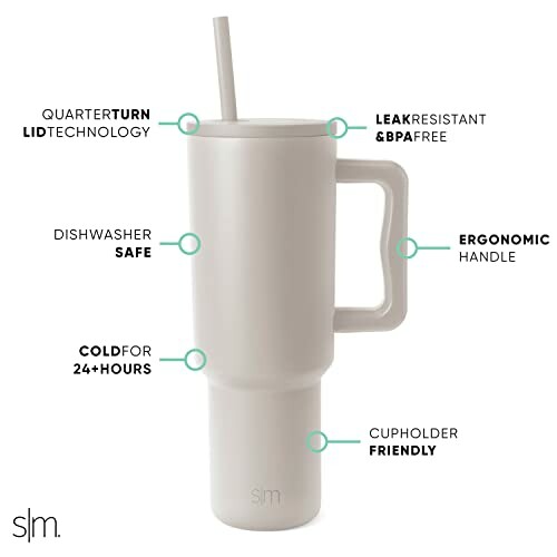 Insulated tumbler cup with lid, straw, and ergonomic handle.